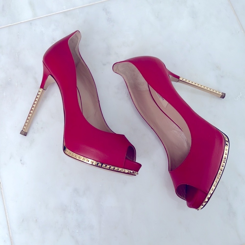 Classic Valentino open toe pumps with gold heels.